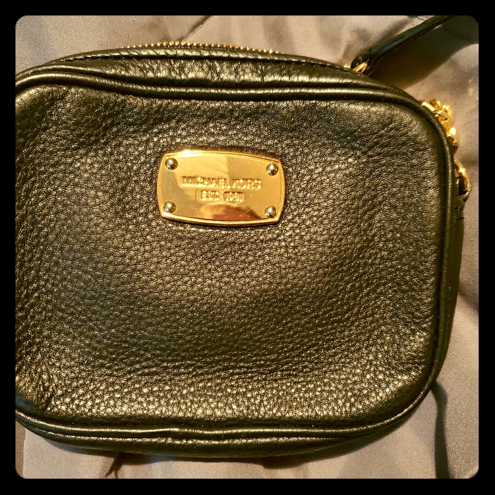 Michael Kors cross body with gold trimming